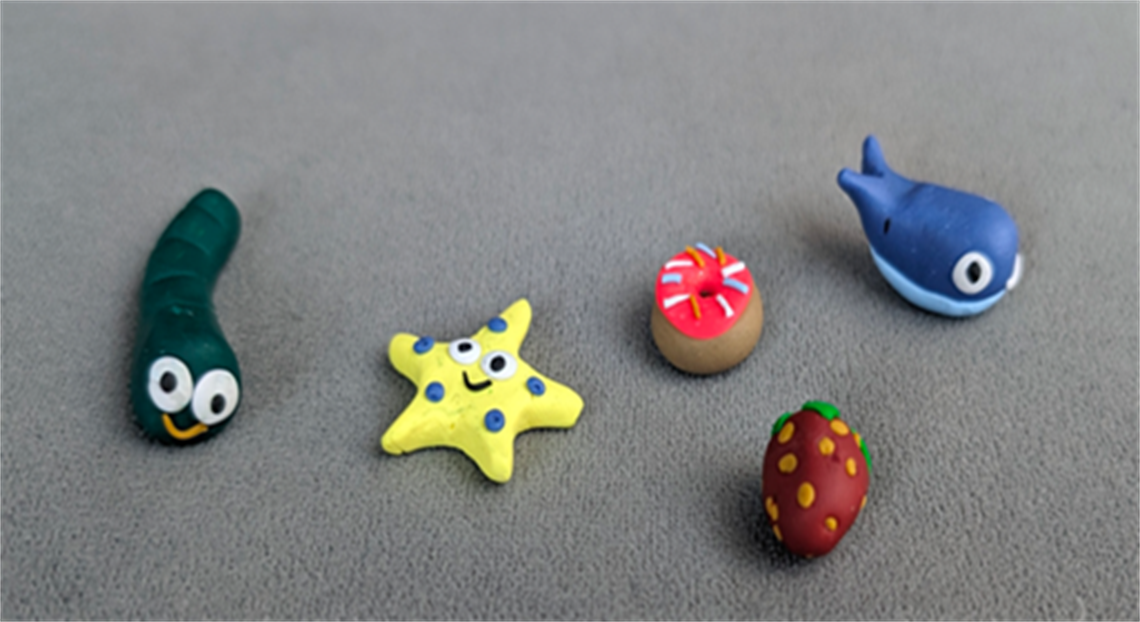 Five small polymer sculptures.